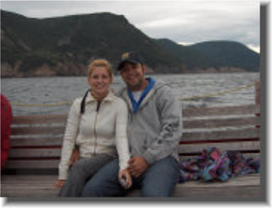 A young couple relaxing aboard the Oshan.